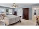 Main bedroom featuring bright natural lighting and a closet with folding doors at 1135 Parkview Sw Way, Lilburn, GA 30047