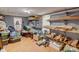 Unfinished basement with shelves for storage at 525 Hilliard Ct, Suwanee, GA 30024