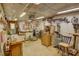 View of the basement workshop with several pieces of equipment at 525 Hilliard Ct, Suwanee, GA 30024