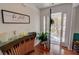 Inviting home entrance with hardwood flooring, a stylish console table, and a clear view of the front porch at 525 Hilliard Ct, Suwanee, GA 30024