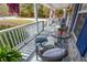 Cozy front porch with comfortable seating, stylish decor, and a relaxing atmosphere overlooking the neighborhood at 525 Hilliard Ct, Suwanee, GA 30024
