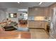 Well-lit kitchen flows into dining area, with granite countertops and updated appliances at 525 Hilliard Ct, Suwanee, GA 30024