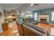 Inviting living room featuring a fireplace and opening up to a modern kitchen at 525 Hilliard Ct, Suwanee, GA 30024