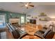 Comfortable living room with a fireplace and entertainment center for relaxation at 525 Hilliard Ct, Suwanee, GA 30024