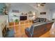 Spacious living room with vaulted ceilings and built-in shelving for entertainment at 525 Hilliard Ct, Suwanee, GA 30024