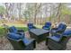 Stone patio with seating area and a table at 525 Hilliard Ct, Suwanee, GA 30024