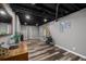 Spacious basement area with wood-look flooring, offering plenty of potential for customization at 116 Myrtle Rd, Woodstock, GA 30189
