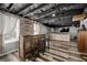 Finished basement featuring a bar area with seating, a window and a lounge area at 116 Myrtle Rd, Woodstock, GA 30189