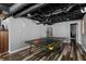 Spacious basement area featuring a ping pong table perfect for recreation and fun at 116 Myrtle Rd, Woodstock, GA 30189