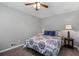 Cozy bedroom with natural light, carpet flooring, and a ceiling fan at 116 Myrtle Rd, Woodstock, GA 30189