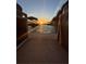 Pontoon boat with carpet flooring and lake views, perfect for relaxing on the water at sunset at 116 Myrtle Rd, Woodstock, GA 30189