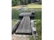 Dock with steps leading down to the water's edge; perfect for swimming, fishing, and boating at 116 Myrtle Rd, Woodstock, GA 30189