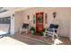 Charming front porch featuring rocking chairs and a beautiful red door, perfect for relaxing at 116 Myrtle Rd, Woodstock, GA 30189