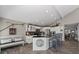 Open kitchen with a counter bar, white cabinets, and an adjacent dining area at 116 Myrtle Rd, Woodstock, GA 30189