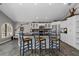 Stylish kitchen with a black countertop island, white cabinetry, and modern appliances at 116 Myrtle Rd, Woodstock, GA 30189