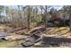 Tranquil lakeside view with private dock access to a beautiful waterfront property at 116 Myrtle Rd, Woodstock, GA 30189