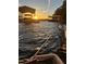 Beautiful waterfront with dock and boat slips in view, capturing the scenic lake setting at sunset at 116 Myrtle Rd, Woodstock, GA 30189