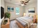 Staged bedroom with large window, neutral decor, and cozy carpet at 1336 Candlelite Ln, Snellville, GA 30078