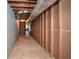 Unfinished basement area with exposed wood framing along the wall at 1564 Pedro Sw Dr, Mableton, GA 30126