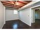 Spacious unfinished basement with dark wood flooring, bright paint and natural light at 1564 Pedro Sw Dr, Mableton, GA 30126