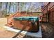 Relaxing hot tub on a wooden deck, perfect for unwinding after a long day at 1564 Pedro Sw Dr, Mableton, GA 30126