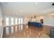Spacious open-concept living room featuring hardwood floors and a gourmet kitchen at 1564 Pedro Sw Dr, Mableton, GA 30126