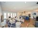 Bright, open-concept living area with hardwood floors, large island, and comfortable seating at 1564 Pedro Sw Dr, Mableton, GA 30126
