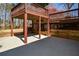 Exterior patio with two-story deck structure, offering ample shade and outdoor enjoyment at 1564 Pedro Sw Dr, Mableton, GA 30126