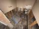 Bathroom reveals exposed studs and plumbing, showcasing renovation or repair in progress at 2863 Windsor Forrest Ct, Atlanta, GA 30349