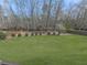 Beautiful view of the lush green backyard space at 3891 Greensward Nw Vw, Kennesaw, GA 30144