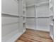 Bright, well-organized closet with shelves and rods offers plenty of storage at 3891 Greensward Nw Vw, Kennesaw, GA 30144