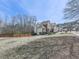 Charming brick home with lush lawn, mature trees, manicured landscaping, and a private deck at 3891 Greensward Nw Vw, Kennesaw, GA 30144