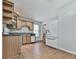 Kitchen features wood cabinets and white refrigerator at 3891 Greensward Nw Vw, Kennesaw, GA 30144