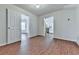 View of luxury vinyl plank flooring and door to kitchen at 3891 Greensward Nw Vw, Kennesaw, GA 30144