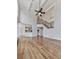View of the living room from the hardwood floors that features a ceiling fan at 3891 Greensward Nw Vw, Kennesaw, GA 30144