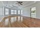 Spacious main bedroom features hardwood floors, tray ceiling, and lots of windows for abundant natural light at 3891 Greensward Nw Vw, Kennesaw, GA 30144