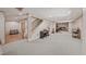 Spacious carpeted basement with staircase, and a piano at 4370 Landover Way, Suwanee, GA 30024