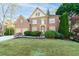 Charming two-story brick home with well-manicured lawn and a two-car garage at 4370 Landover Way, Suwanee, GA 30024