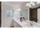 Bright bathroom featuring double sinks with a white quartz countertop and a shower with dark gray brick-style tiling at 105 Simonton (Tract 1) Se Rd, Lawrenceville, GA 30046
