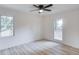 Bright bedroom with hardwood floors and two large windows at 105 Simonton (Tract 1) Se Rd, Lawrenceville, GA 30046