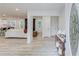 Bright and airy entryway featuring wood flooring and open layout to the living spaces at 105 Simonton (Tract 1) Se Rd, Lawrenceville, GA 30046