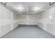 A spacious unfinished two car garage with painted floor at 105 Simonton (Tract 1) Se Rd, Lawrenceville, GA 30046