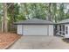 View of the detached garage with a spacious driveway, offering ample parking at 105 Simonton (Tract 1) Se Rd, Lawrenceville, GA 30046