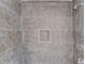 Shower tiled with neutral-toned rectangular tiles with a shower niche at 105 Simonton (Tract 1) Se Rd, Lawrenceville, GA 30046