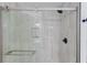 Elegant walk-in shower with gray tile and modern fixtures at 105 Simonton (Tract 1) Se Rd, Lawrenceville, GA 30046