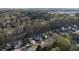 Beautiful neighborhood view showcases well-maintained homes surrounded by lush greenery and mature trees at 10715 Glenbarr Dr, Johns Creek, GA 30097
