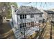 Aerial view of backyard with a charming pergola-covered patio perfect for outdoor entertaining at 10715 Glenbarr Dr, Johns Creek, GA 30097