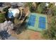 Aerial image featuring a community pool, tennis courts, and a well-landscaped recreation area at 10715 Glenbarr Dr, Johns Creek, GA 30097