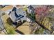 Overhead shot of the property showcasing the backyard, deck, pergola, and surrounding neighborhood at 2130 Waters Ferry Dr, Lawrenceville, GA 30043