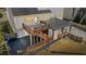Spacious back deck with multiple levels, outdoor seating, and landscaping, perfect for relaxation and entertaining at 2130 Waters Ferry Dr, Lawrenceville, GA 30043